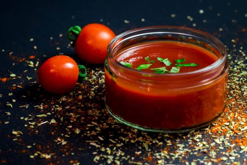 bowl of tomato juice with fresh fruit but Can Hamsters Eat Tomato Juice?