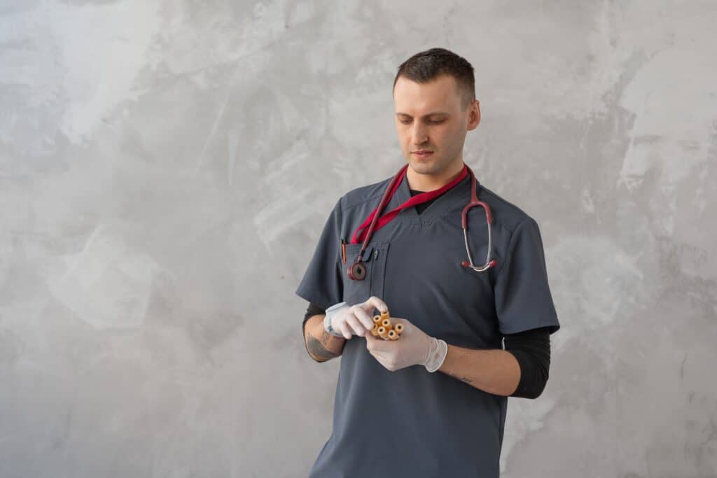 Vet about to examine hamster for signs of illness