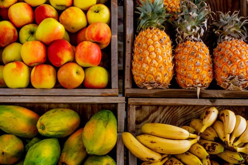 fruits on a wooden shelf
