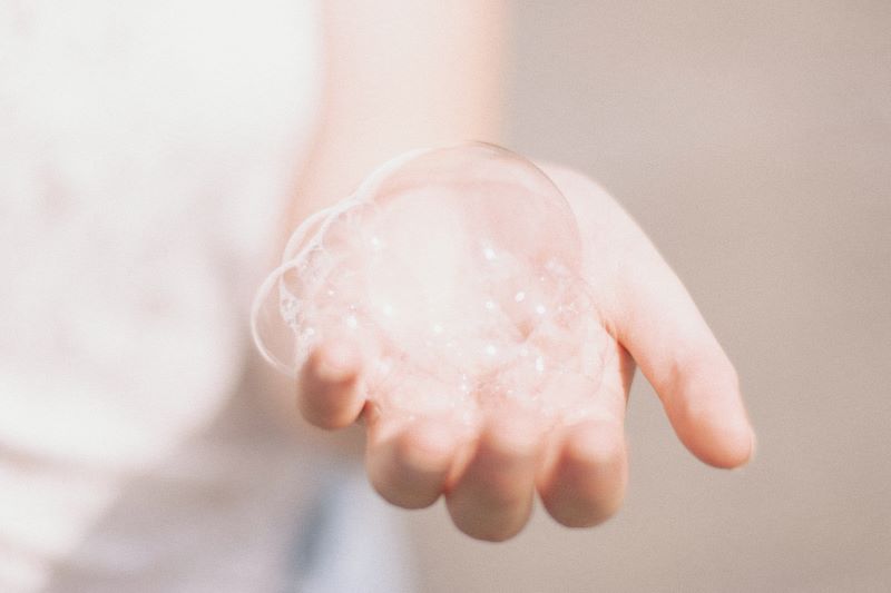 woman with foam in her hand