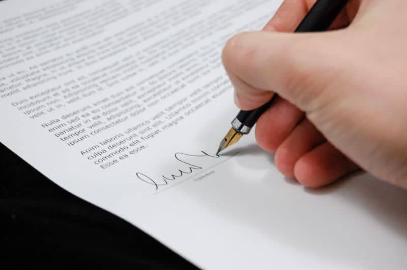 legal paper being signed